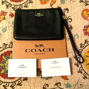 Coach Wristlet in Black. New